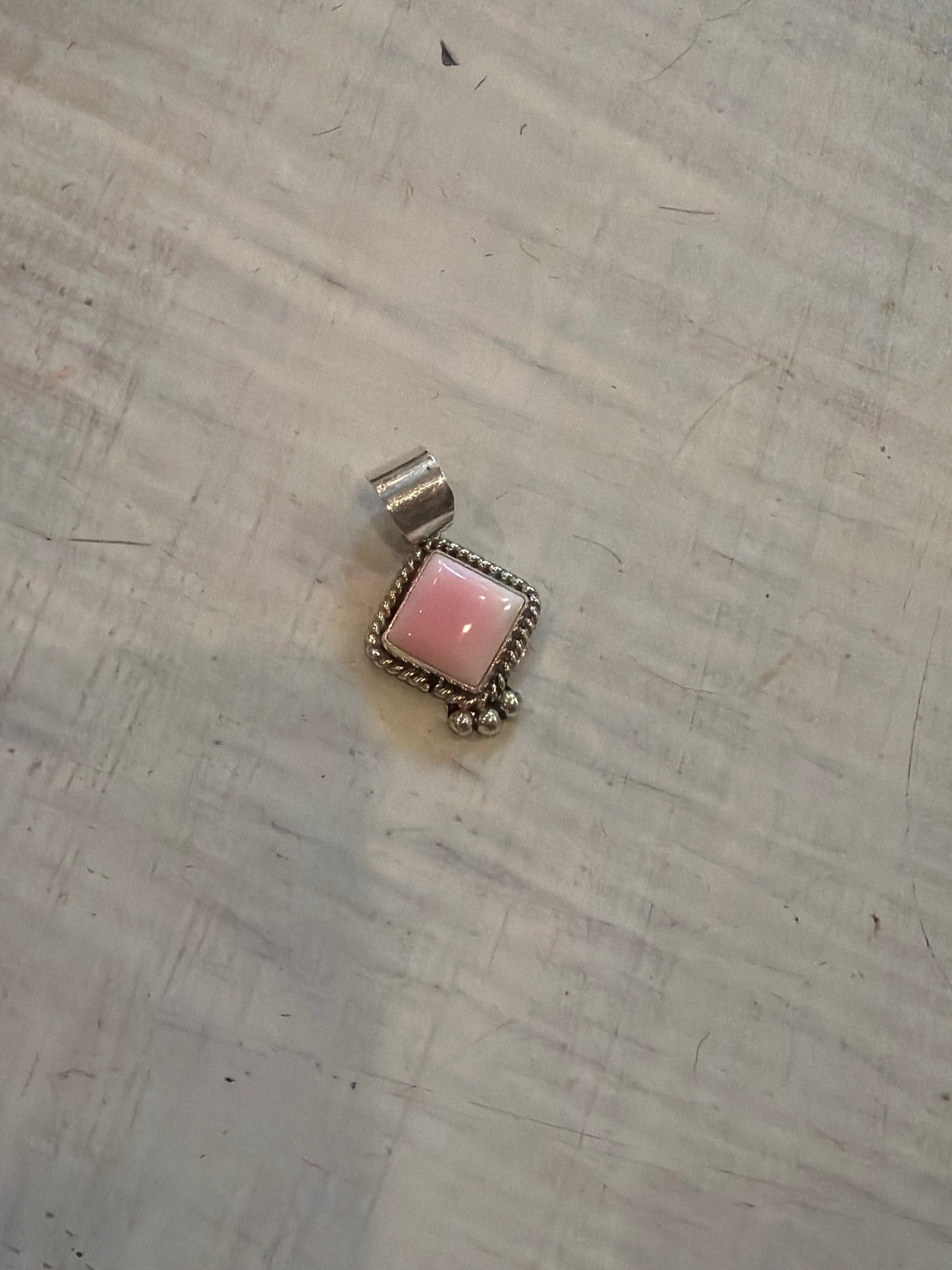 Tonya pink conch pendant