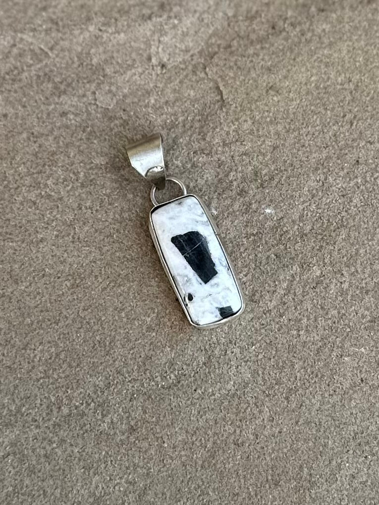 White buffalo pendant