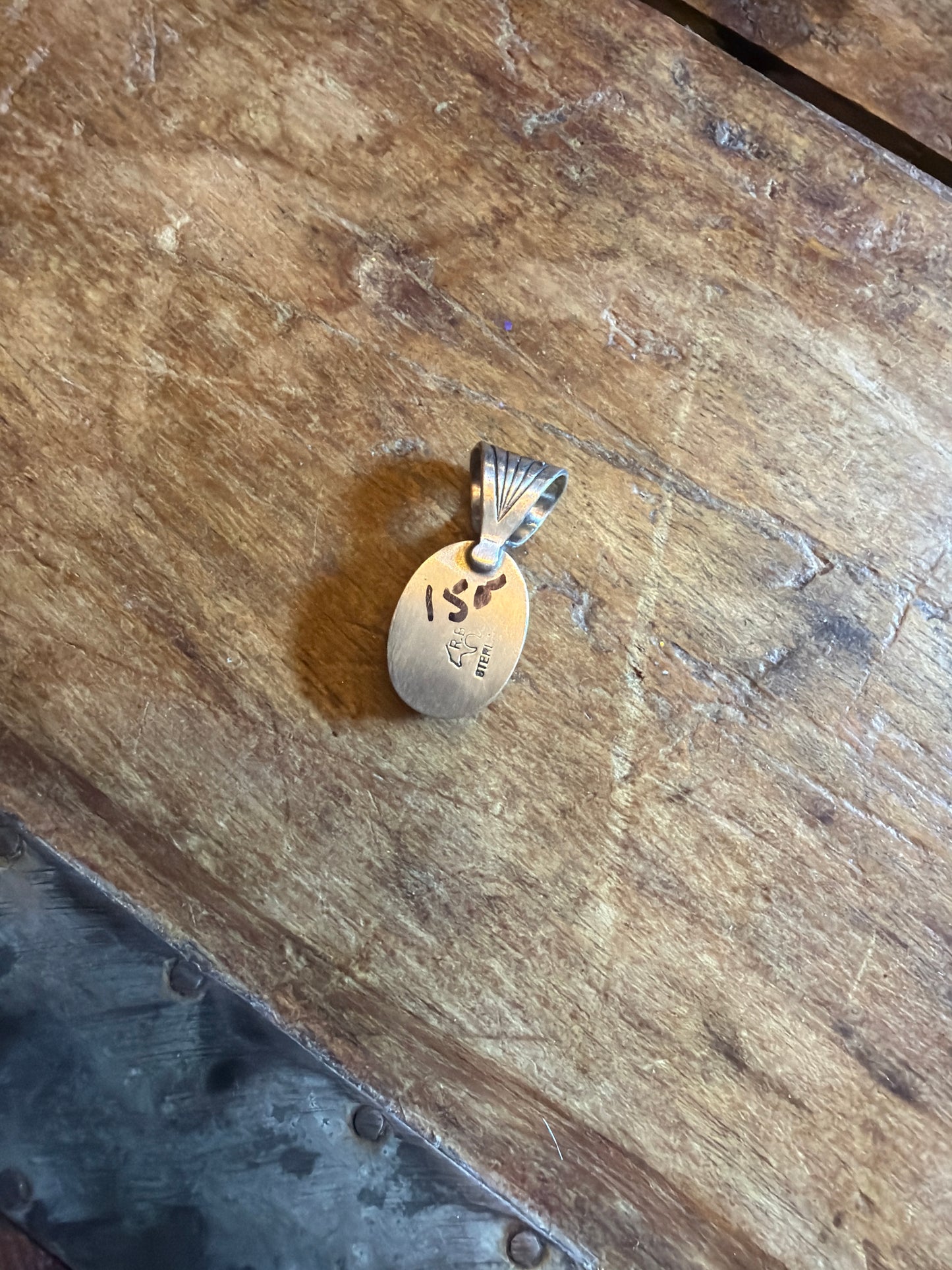 Mande running Bear Sonoran pendant