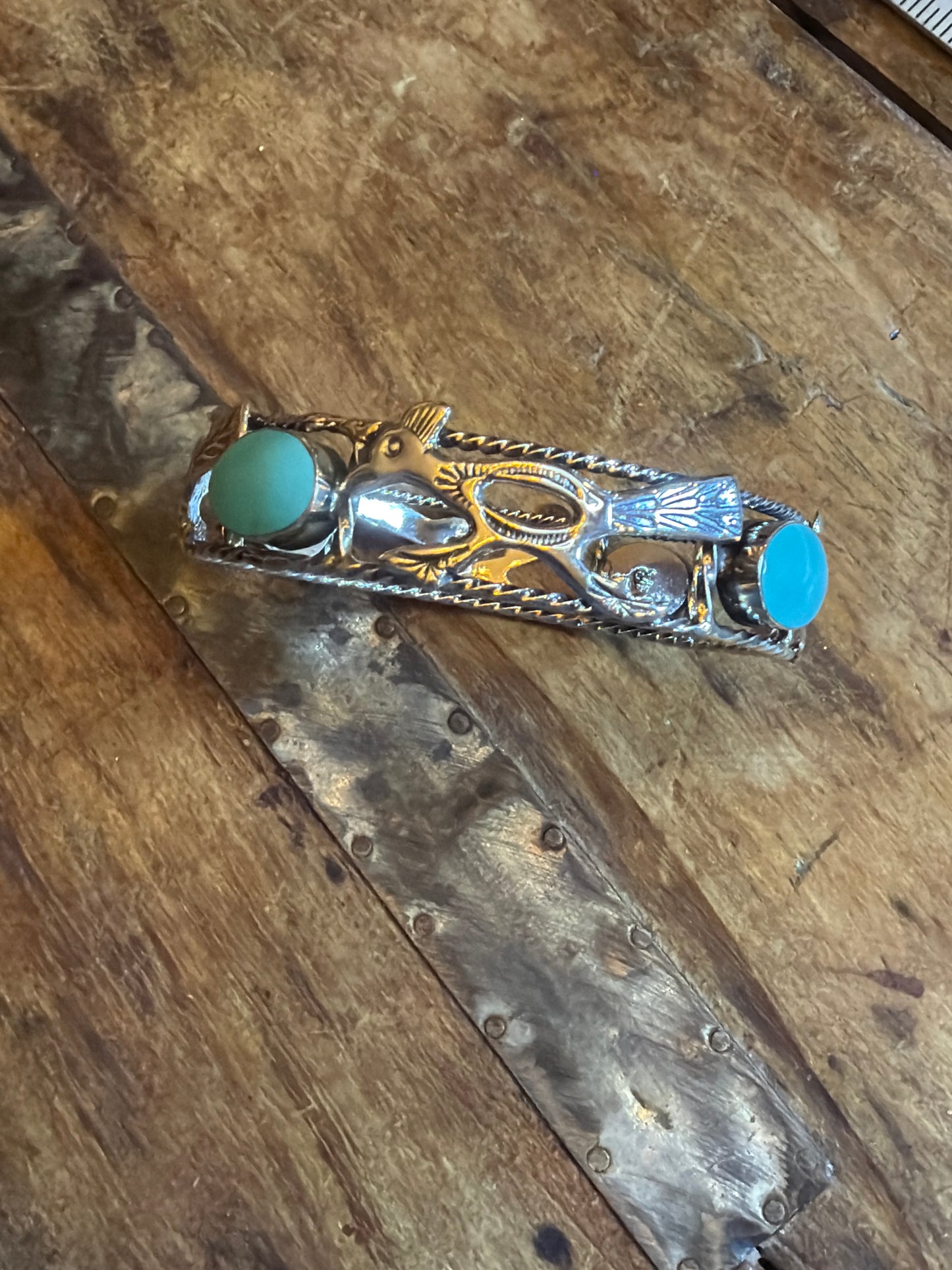 Nadine roadrunner bangle 8 3/8 stamped running bear(David Lopez) 