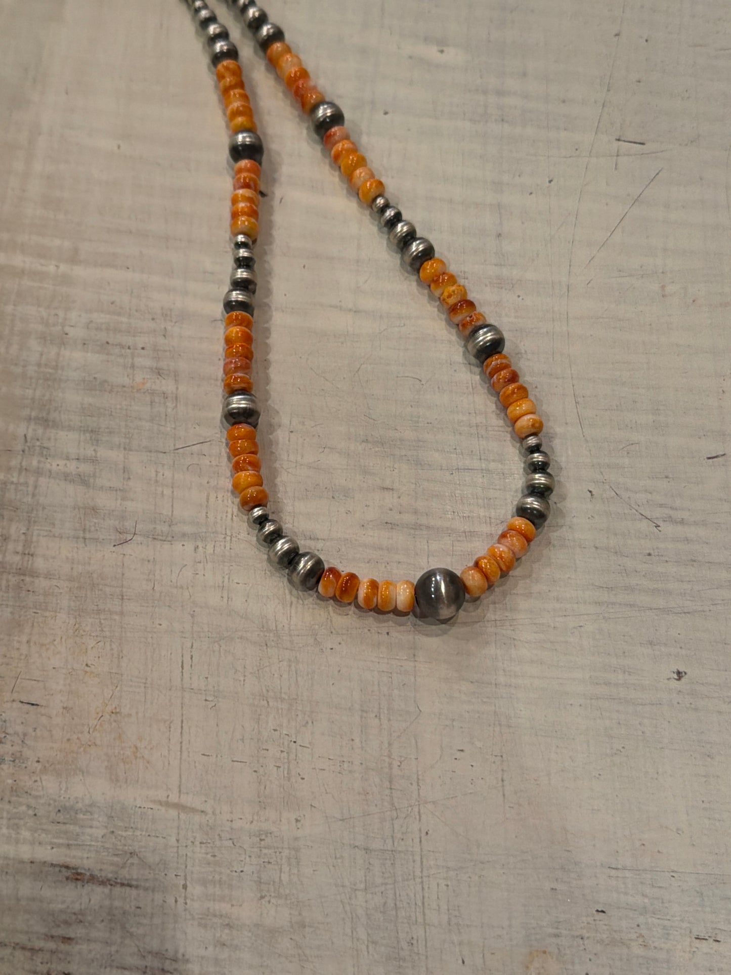 Jillian -Orange spiny machine made necklace