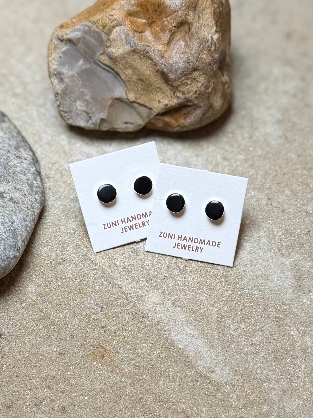 Black stud earring