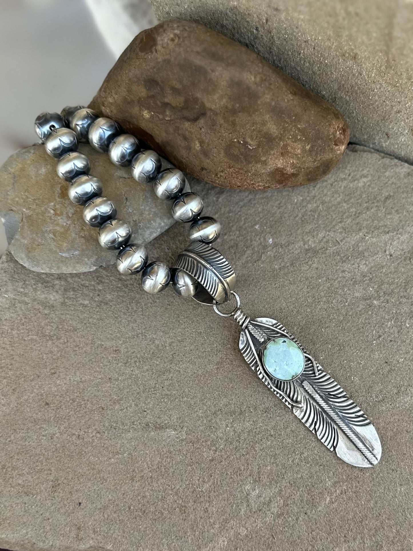 Feathers pendant