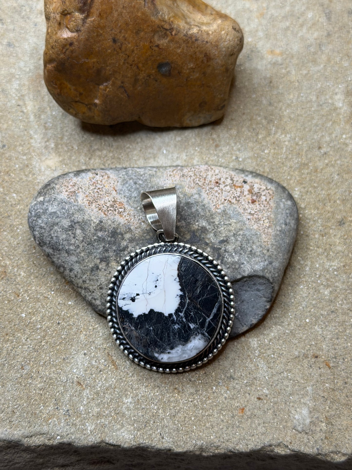 Cassy - White Buffalo Round Pendant