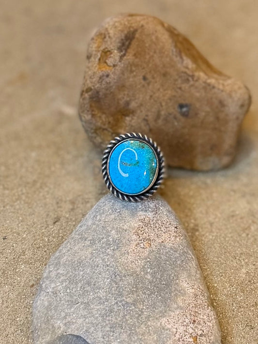 Adjustable Sonoran ring with stamped band