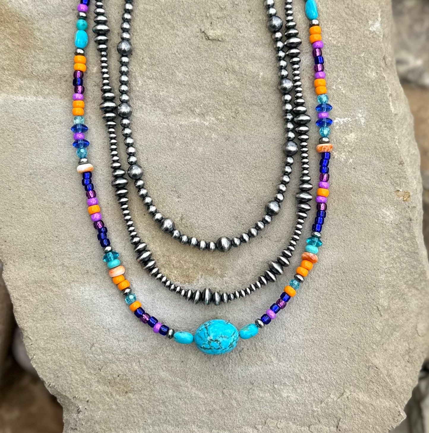 Multi bead chunk center stone