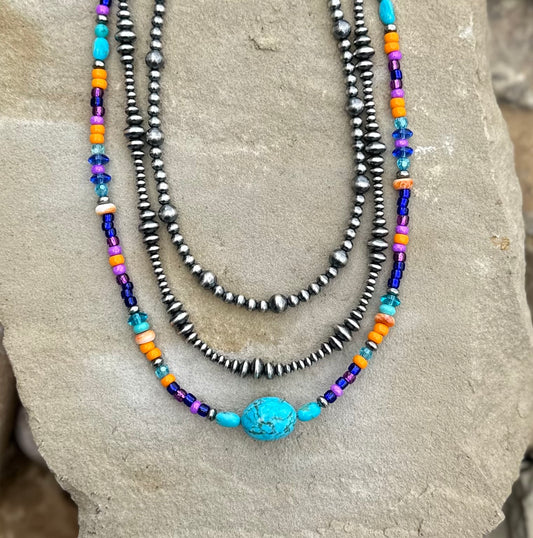 Multi bead chunk center stone