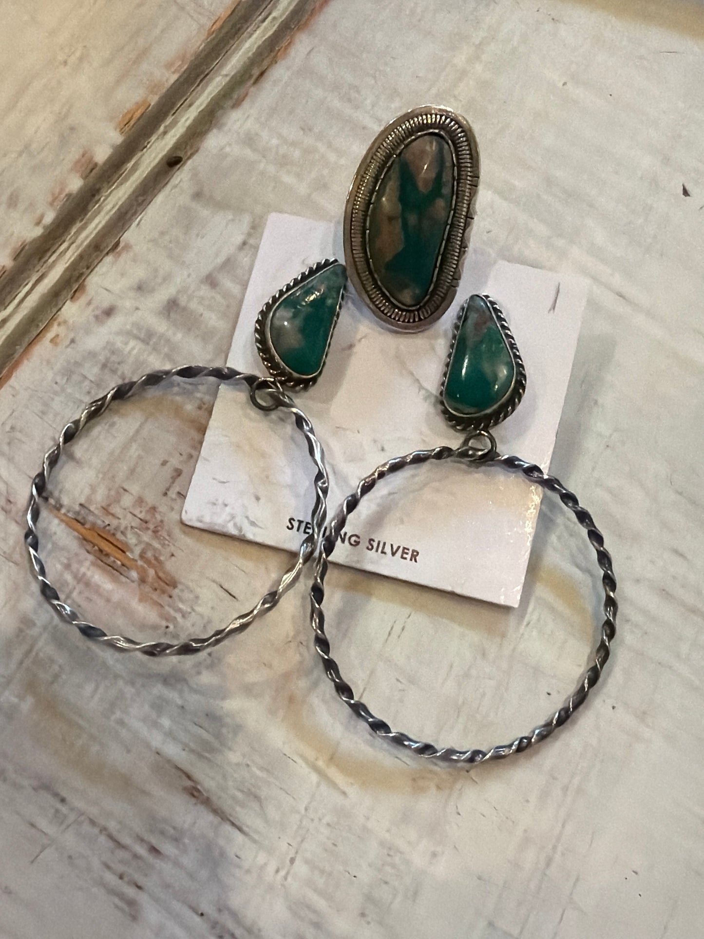 Sally this listing is for Turquoise hoop earrings, and a Turquoise adjustable ring, both stamped by the artist ￼