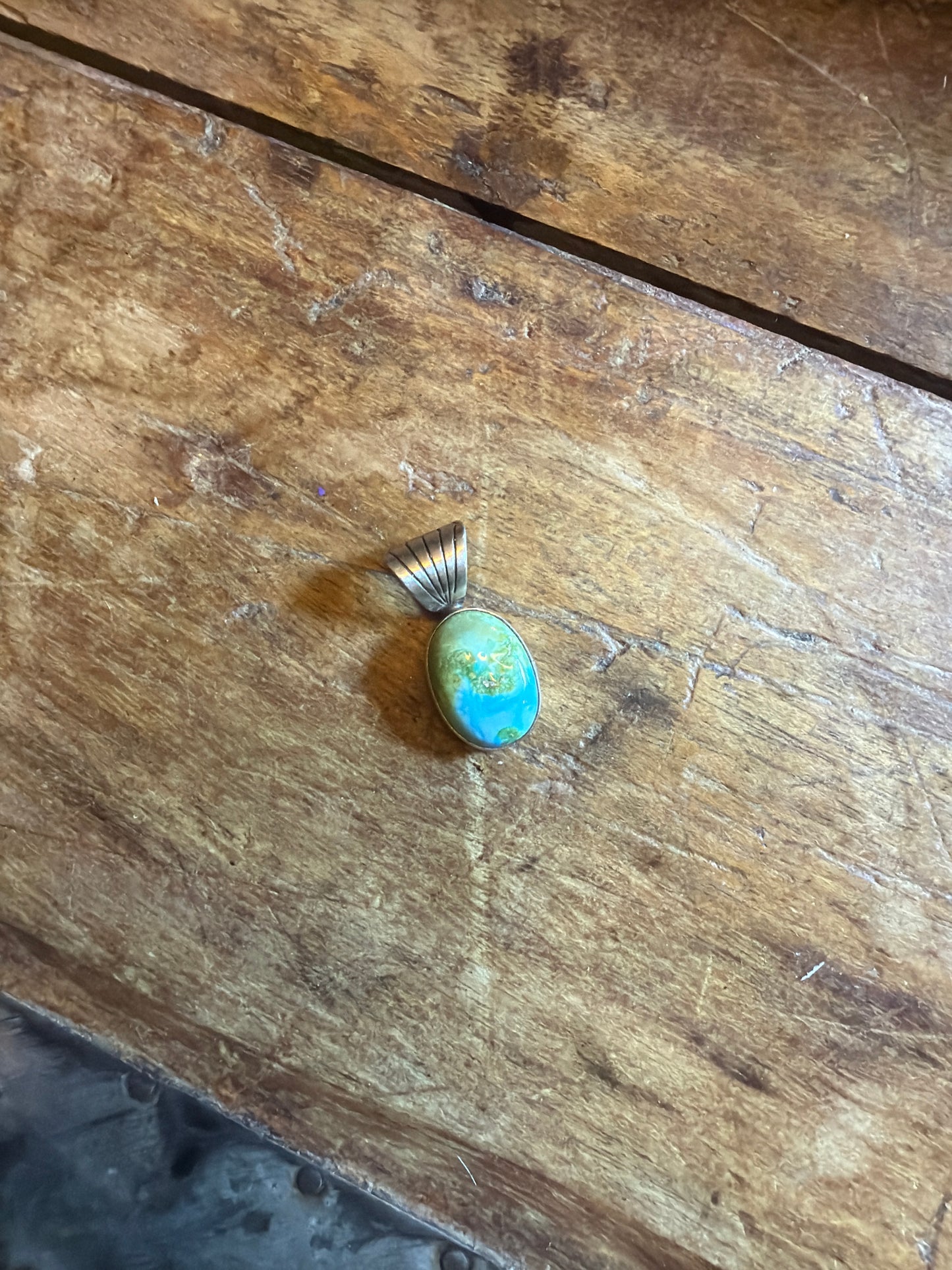 Mande running Bear Sonoran pendant