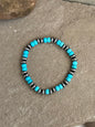 Saucer bead, and turquoise stretchy
