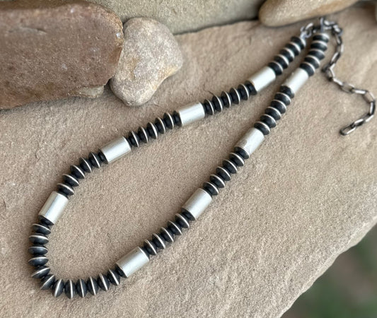 Sterling saucer and tube necklace