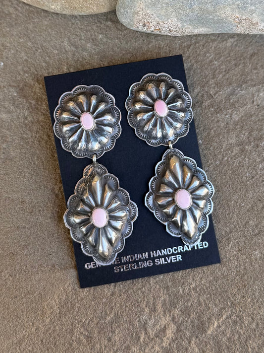 Pink conch statement earring