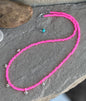 Hot pink beaded necklace with extended chain and hearts